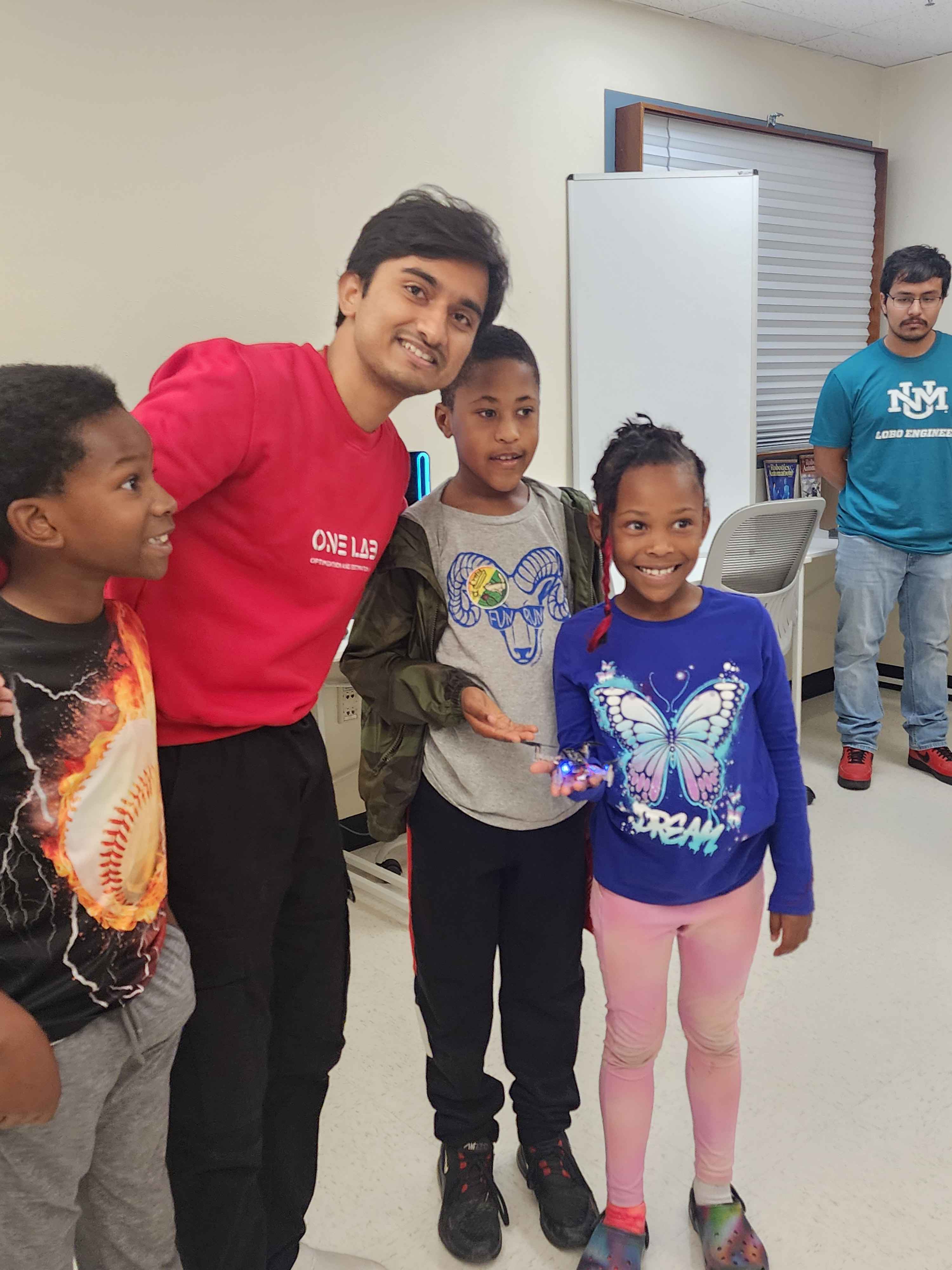 Lab members with K-12 students
